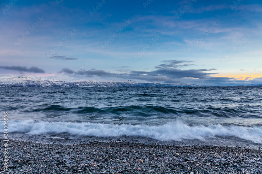 beautiful view over beach. Tornetrask, Sweden. Polar night. long shutter speed