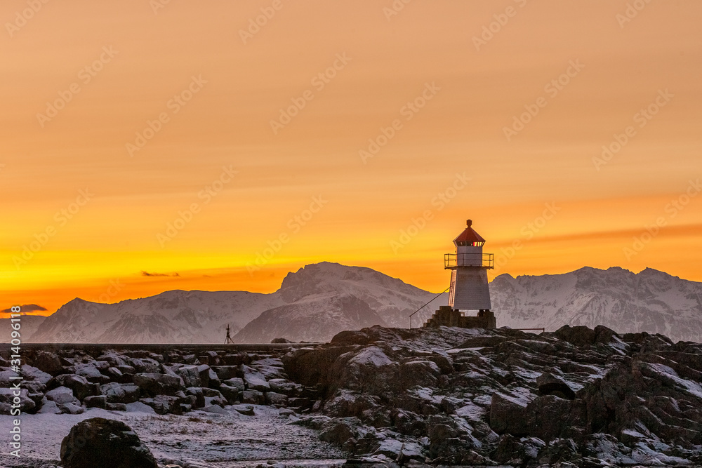 Amazing Sunset over the lighthouse in Lofoten islands, Norway.