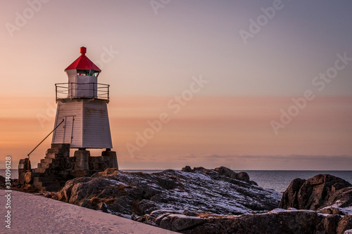 Amazing Sunset over the lighthouse in Lofoten islands, Norway.