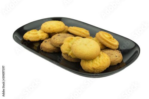 Obraz na płótnie Cookies on a plate on a white background. Clipping Path. Full depth of field. w salonie