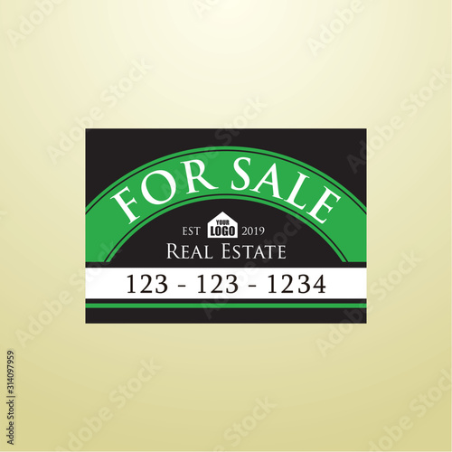 Real Estate Yard Sign Board for Sale Sign in green color photo