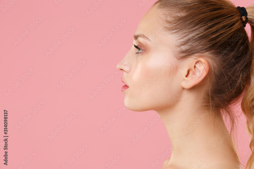 Close up blonde half naked woman 20s perfect skin nude make up blue eyes isolated on pastel pink wall background studio portrait. Skin care healthcare cosmetic procedures concept. Mock up copy space. Close up blonde half naked woman 20s perfect skin nude make up blue eyes isolated on pastel pink wall background studio portrait. Skin care healthcare cosmetic procedures concept. Mock up copy space.