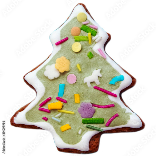 Gingerbread cookies Christmas tree for Christmas and New year. Gingerbread. Gifts and celebration. Festive background. Isolated cookies. Christmas cookies on a bright colored background.