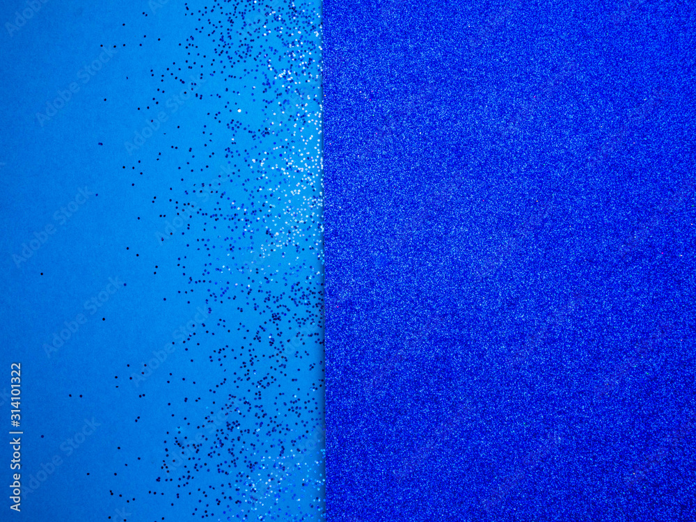 Blue shiny cardboard background, trendy color of 2020 year