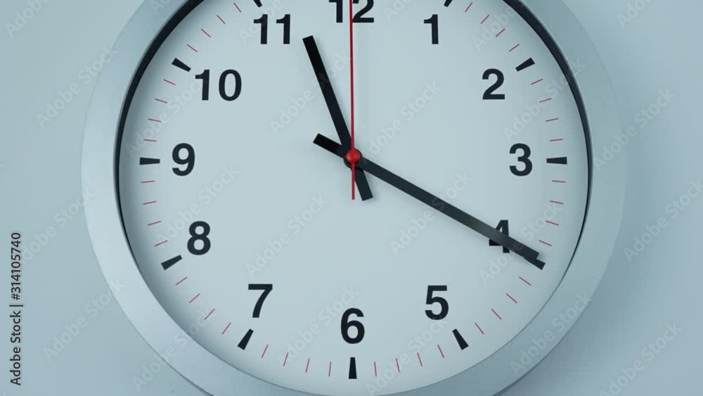 Gray watch beginning of time 11.00 am or pm. on White background, Time Lapse Clock walking 60 minute. Gray watch beginning of time 11.00 am or pm. on White background, Time Lapse Clock walking 60 minute.