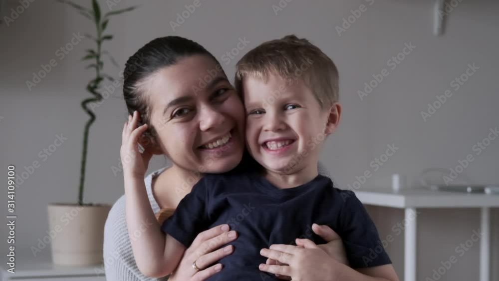Portrait of lifestyle Happy family day. Family portrait. Happy laughing toddler hugging with mother. Healthy smile. Happy childhood. Mother Day Portrait of lifestyle Happy family day. Family portrait. Happy laughing toddler hugging with mother. Healthy smile. Happy childhood. Mother Day