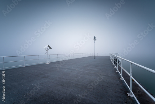 Wooden jetty by the sea on a foggy morning. Baltic Sea Gdynia  Poland