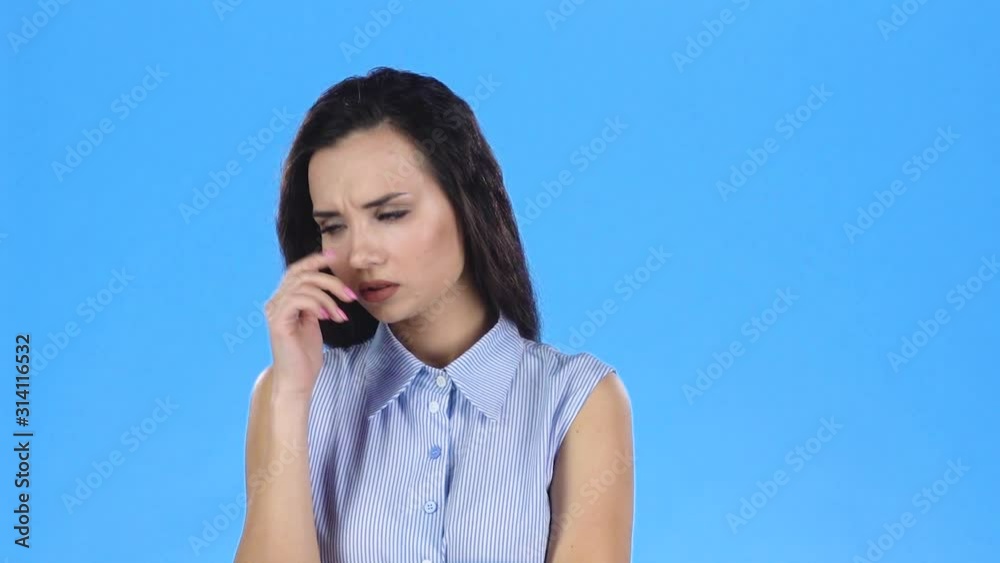 Young woman is thoughtful and then finding solution. Slow motion Young woman is thoughtful and then finding solution. Slow motion