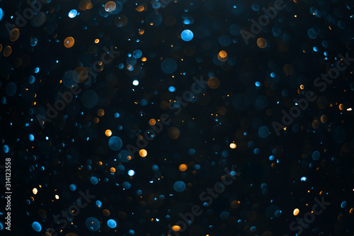 abstract bokeh background, colorful particles