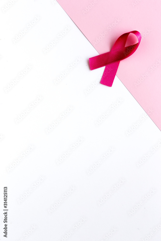 Pink ribbon on a colored background. Cancer Pink ribbon on a colored background. Cancer