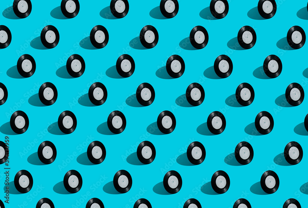 Vinyl records on a blue background. Pattern Vinyl records on a blue background. Pattern