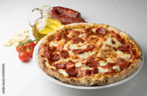pizza with salami on the white background