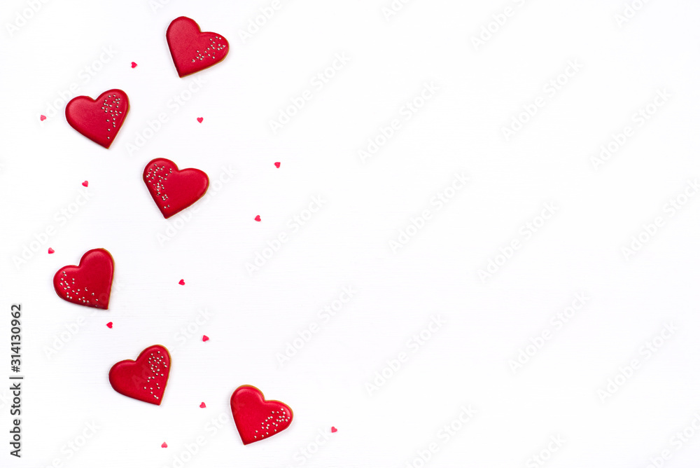 Gingerbread cookies with frosting in the shape of a heart. Valentines day concept. Flat lay, top view, copy space for text.