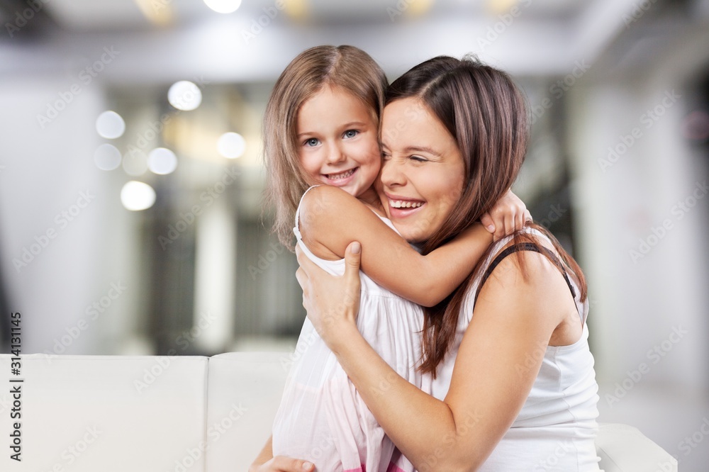 Happy Mother and daughter hugging Happy Mother and daughter hugging