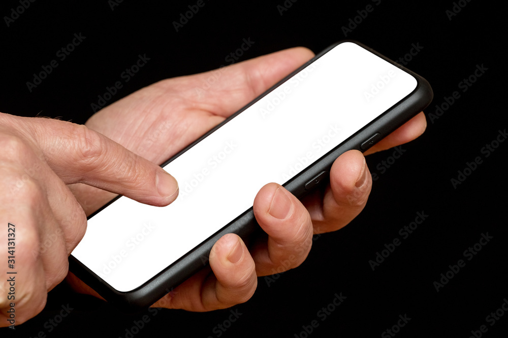 White background for inserting text or image on a phone display that holds in hand man on black background_ White background for inserting text or image on a phone display that holds in hand man on black background_