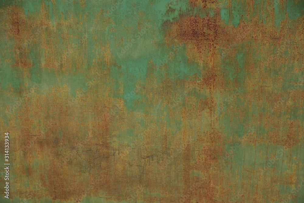 colored iron texture from part of an old green metal wall in brown rust