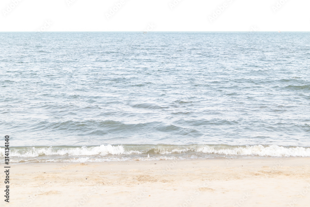 The ocean waves that blow into the beach at the time of clear sky