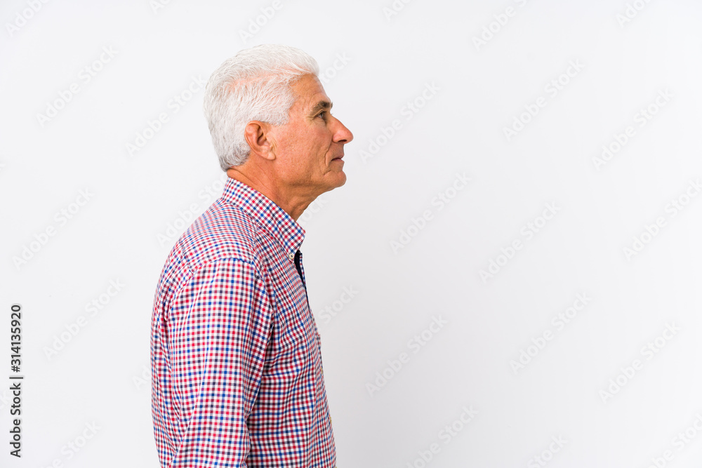 Senior caucasian man isolated gazing left, sideways pose. Senior caucasian man isolated gazing left, sideways pose.
