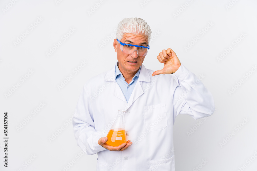 Mature chemical man isolated showing a dislike gesture, thumbs down. Disagreement concept. Mature chemical man isolated showing a dislike gesture, thumbs down. Disagreement concept.