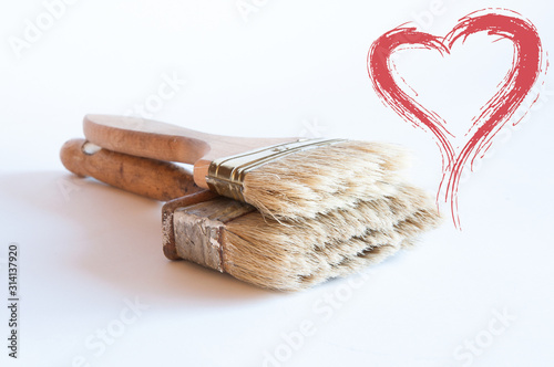 Brush for painting. Spatter stains and blots. Multi-colored and bright. Repairs. Red heart and love