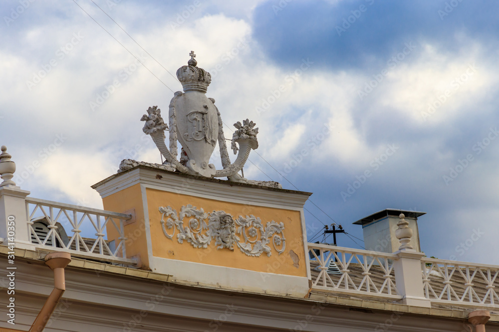 Monogram of russian emperor Paul the First on a roof of Pavlovsk Palace, Russia