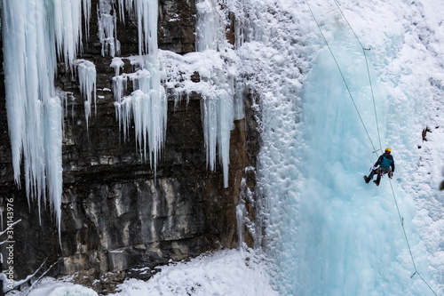 Ice climber at Johnston Canyon falls. photo