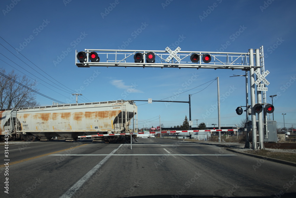 Railroad caboose crossing road