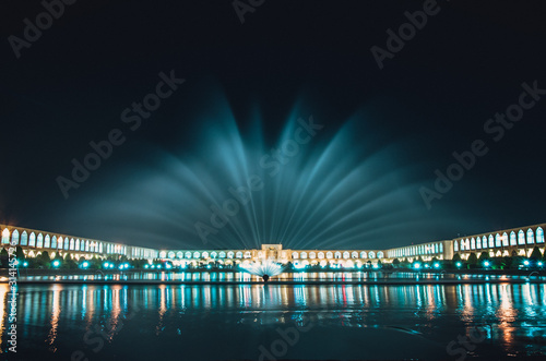 Long exposure night shot of large square and fountain in Esfahan
