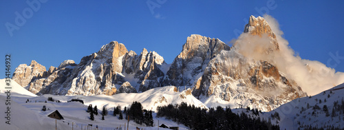 Beautiful winter landscape of Dolomitic group of Pale di San Martino as seen from Passo Rolle on the Italian Alps. Trento, Italy.