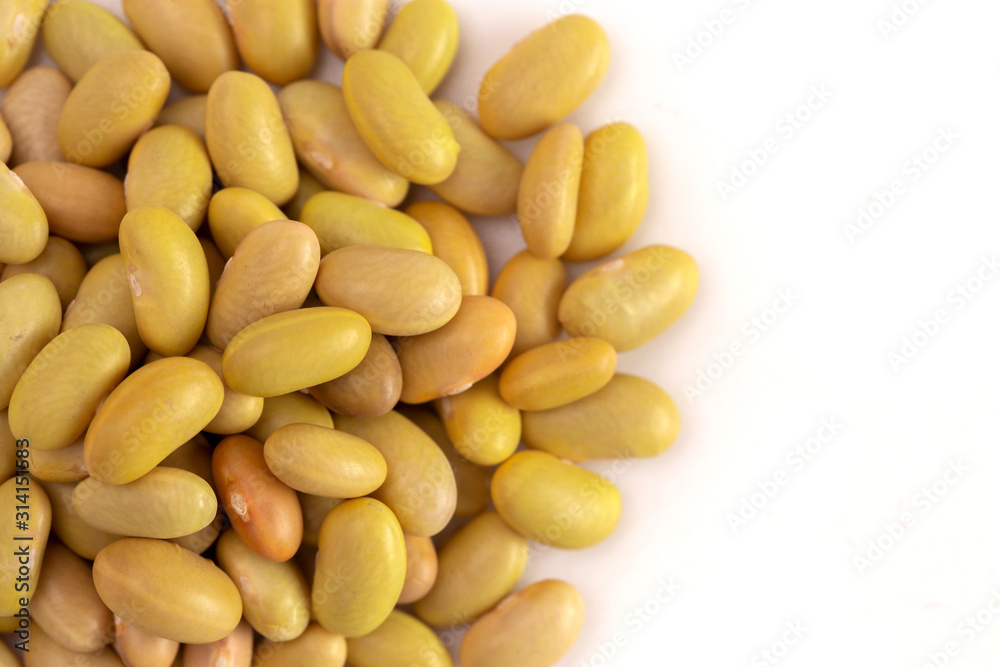 Pile of Dry Mayocoba Beans Isolated on a White Background Pile of Dry Mayocoba Beans Isolated on a White Background