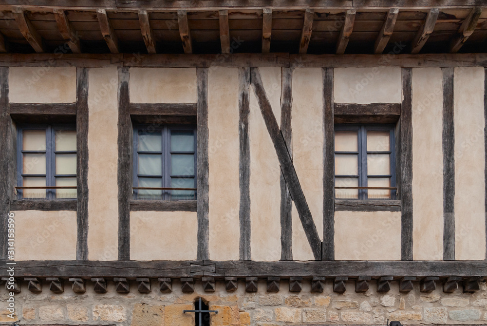 Carcassonne city timbered house in medieval town.