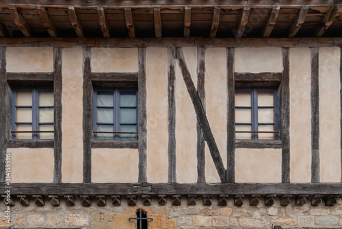 Carcassonne city timbered house in medieval town.