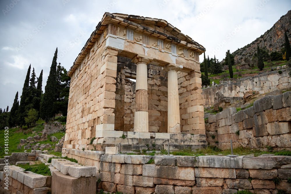 Treasury of Athens, archaeological site of Delphi along the slope of Mount Parnassus, UNESCO World Heritage, Greece.