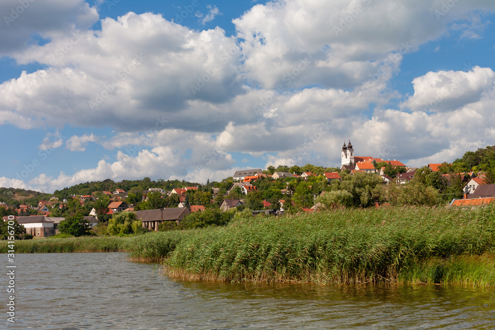 Obraz premium Tihany village with the abbey and the innert lake in the front with reed at Lake Balaton, Hungary