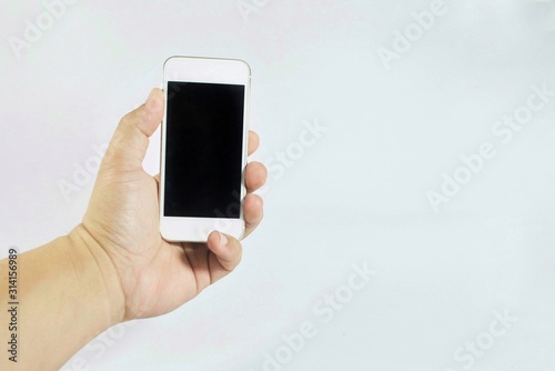 hand holding mobile phone isolated on white