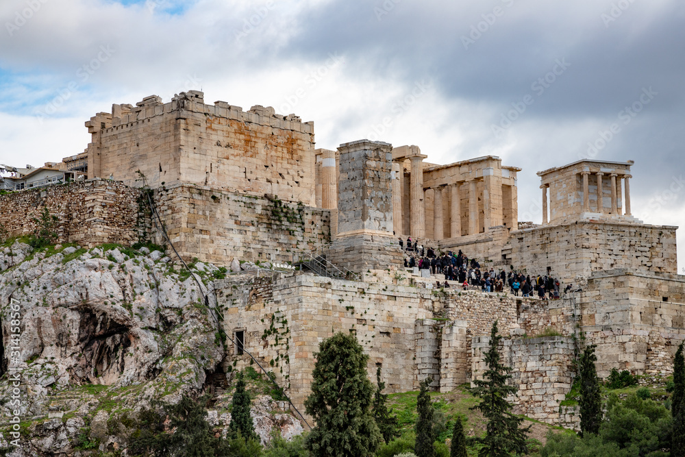 door of the acropolis of Athens chock full of tourists. Greece door of the acropolis of Athens chock full of tourists. Greece