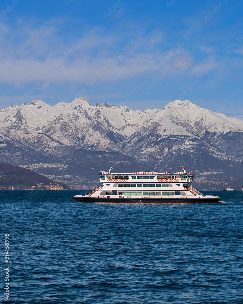 a boat on Lake Como during a cold winter day. 