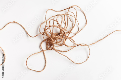 Vászonkép Tangled thread isolated on white illustrating concepts of complex problem, obsta