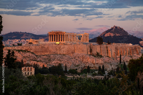 The Parthenon and the Acropolis of Athens at sunset. Greece