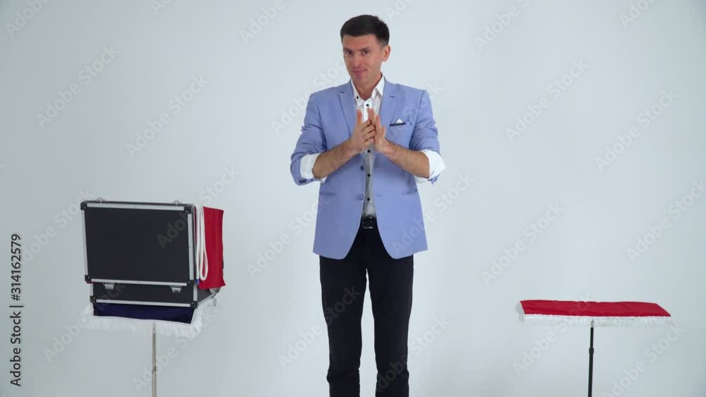 Magician is preparing to speak on a white background