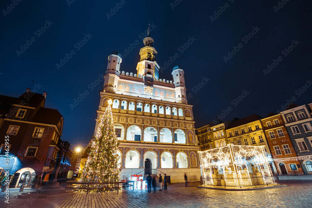 historical city hall in Poznan by night, Poland