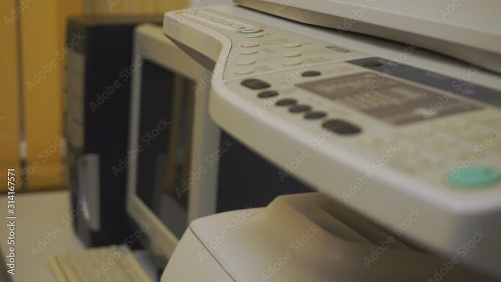 Old office equipment. Old desktop computer and old copy machine Old office equipment. Old desktop computer and old copy machine