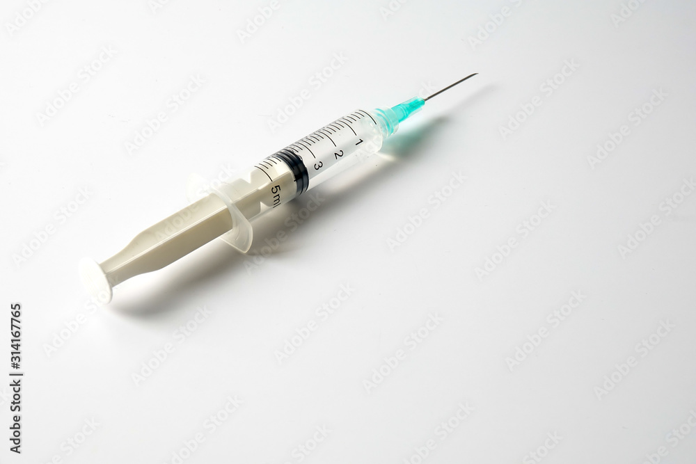 Medical concept with syringe for vaccination isolated on white. Medical concept with syringe for vaccination isolated on white.