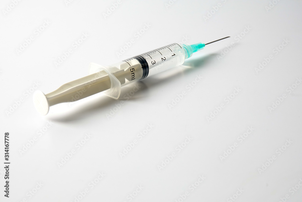 Medical concept with syringe for vaccination isolated on white. Medical concept with syringe for vaccination isolated on white.