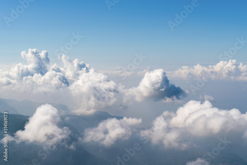 Fototapeta Naklejka Na Ścianę i Meble -  Beautiful Cloudscape. Aerial view of clouds and sky. Bird eye view from airplane window. Clouds panorama from airplane. High resolution photo
