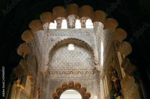 Cordoba Spain, arches and islamic carved decoration in the Mosque–Cathedral of Cordoba photo