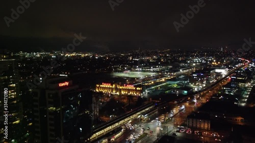 Wallpaper Mural Aerial view of night city with the highway and railway station in the night Torontodigital.ca
