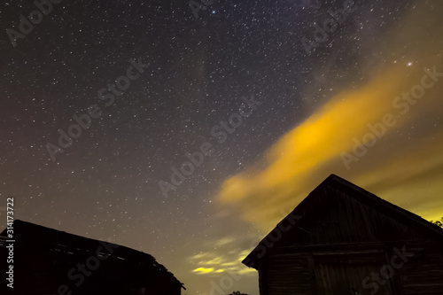 Timelapse Starry sky background video stars in night sky and Mil photo