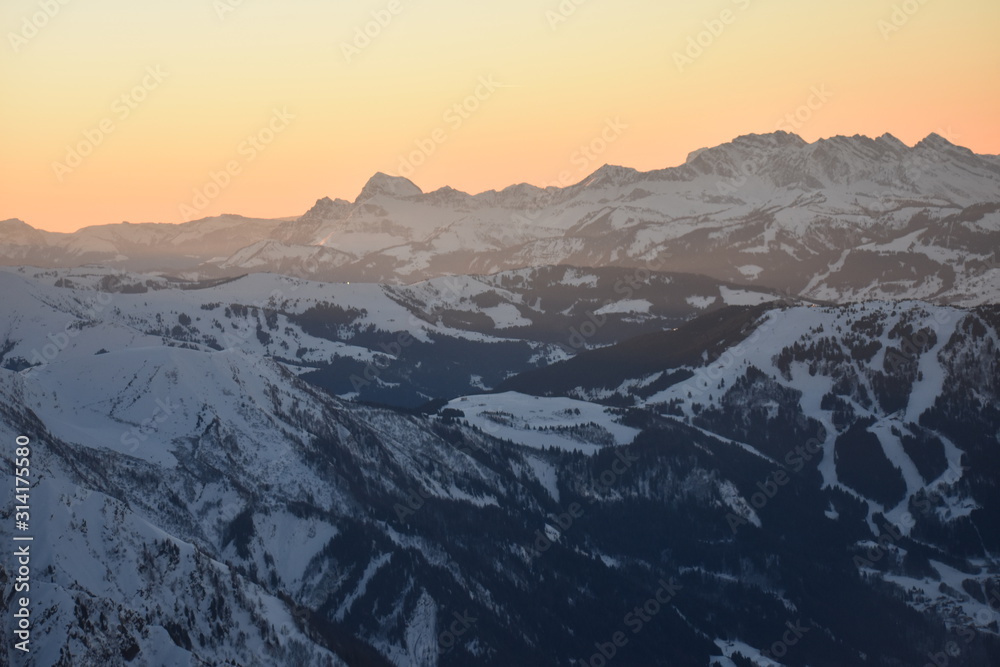sunrise over winter mountains