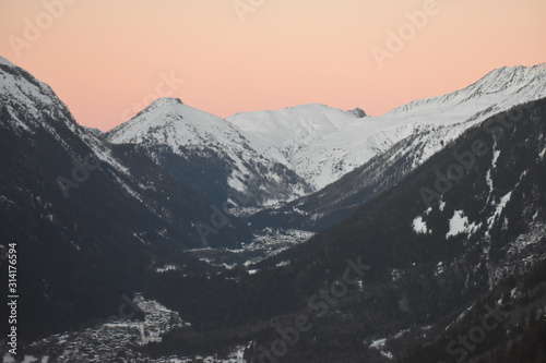 view of alps in winter sunset